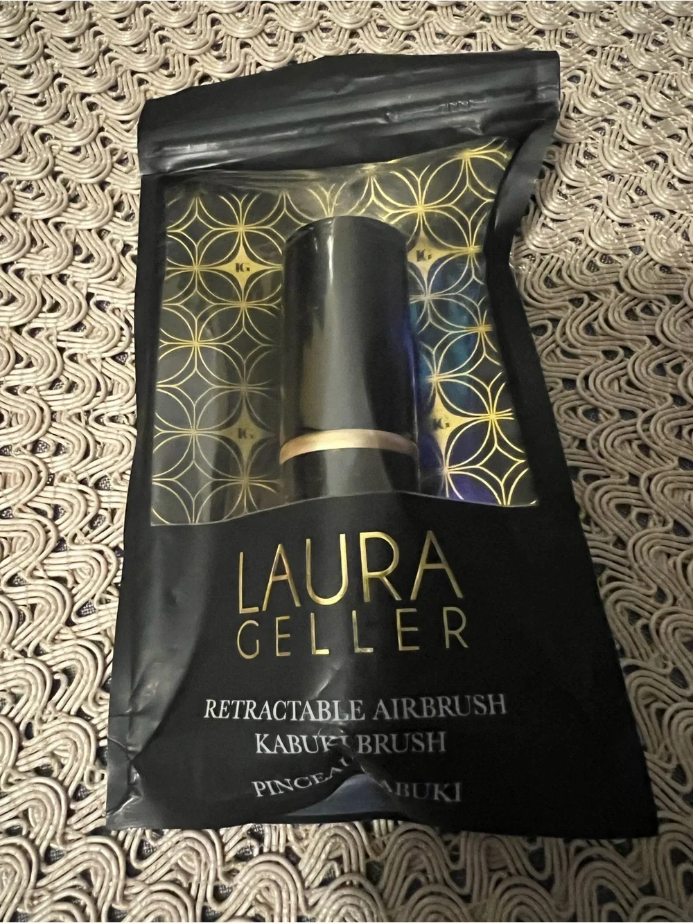 Laura Geller Black and Gold Retractable Kabuki Brush